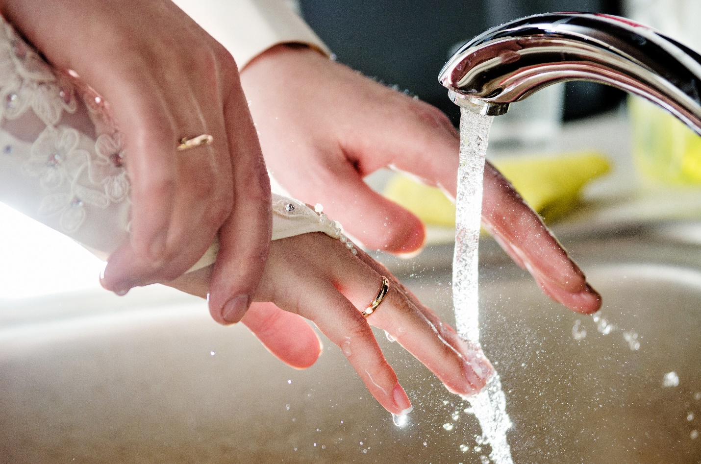 washing hands with wedding rings