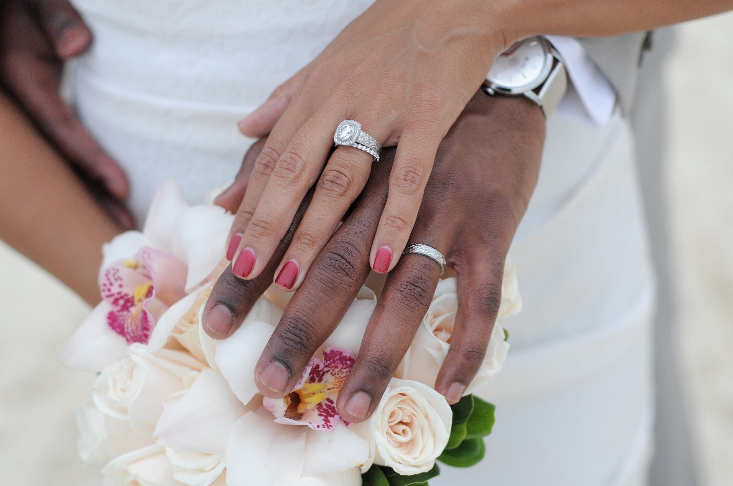 women and men wedding rings with flowers